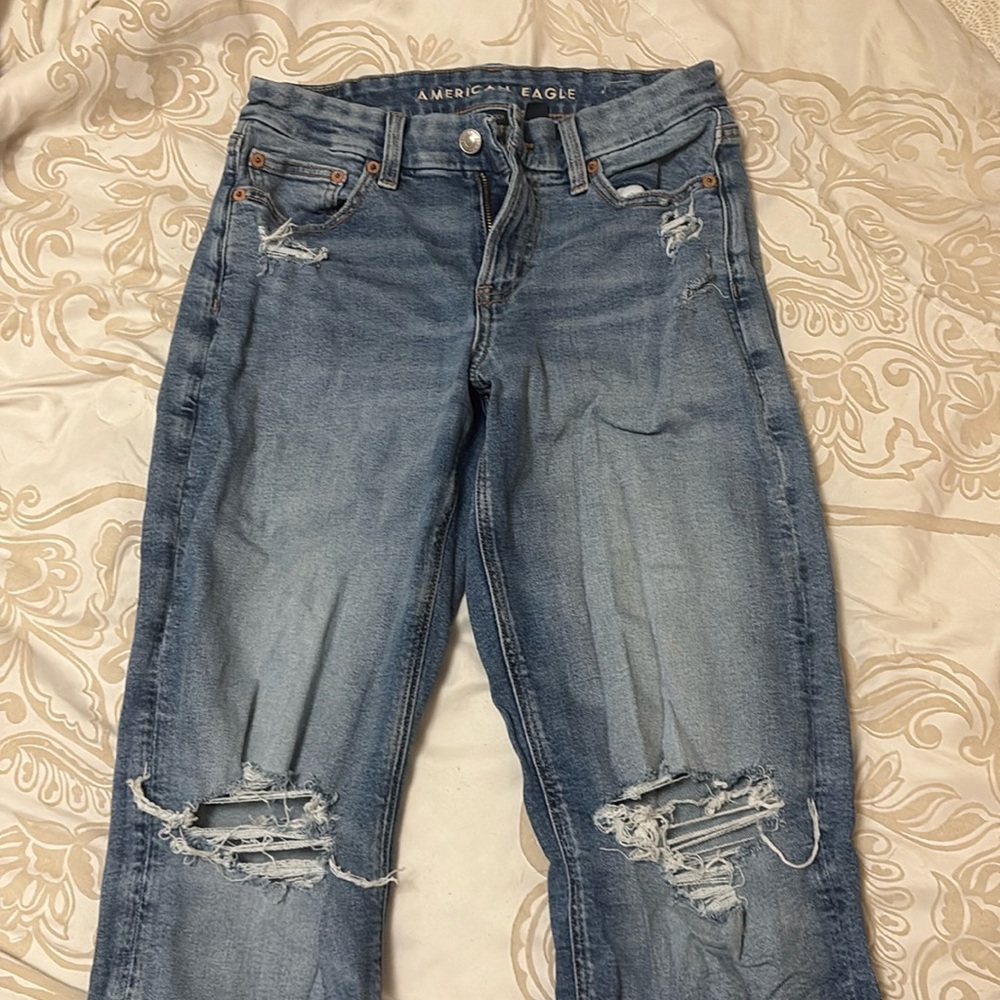 American Eagle distressed at the knee jeans